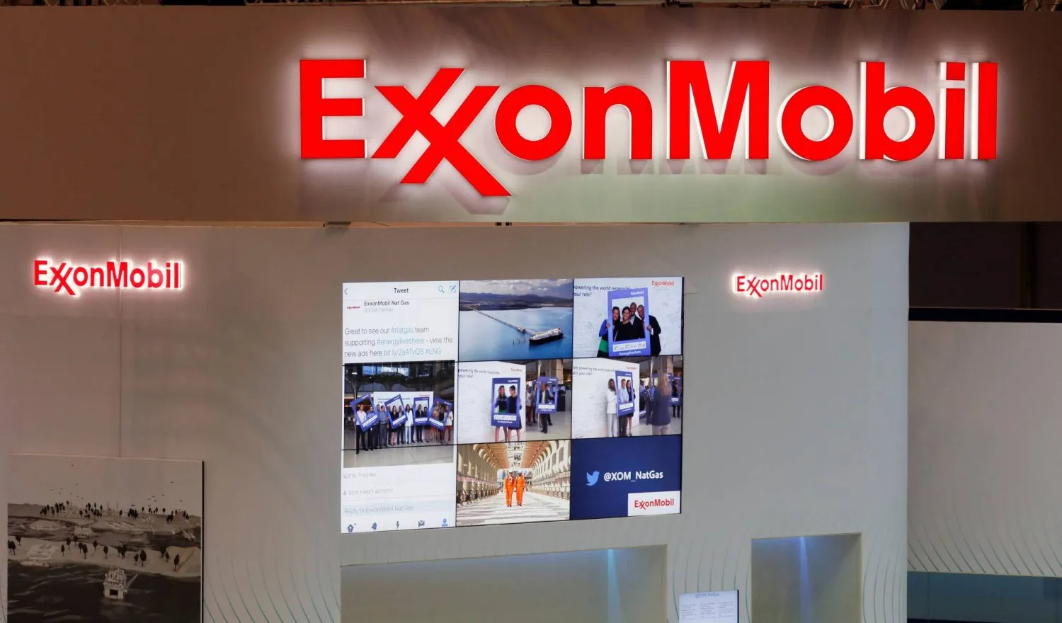 Logos of ExxonMobil are seen in its booth at Gastech, the world’s biggest expo for the gas industry, in Japan (Reuters)