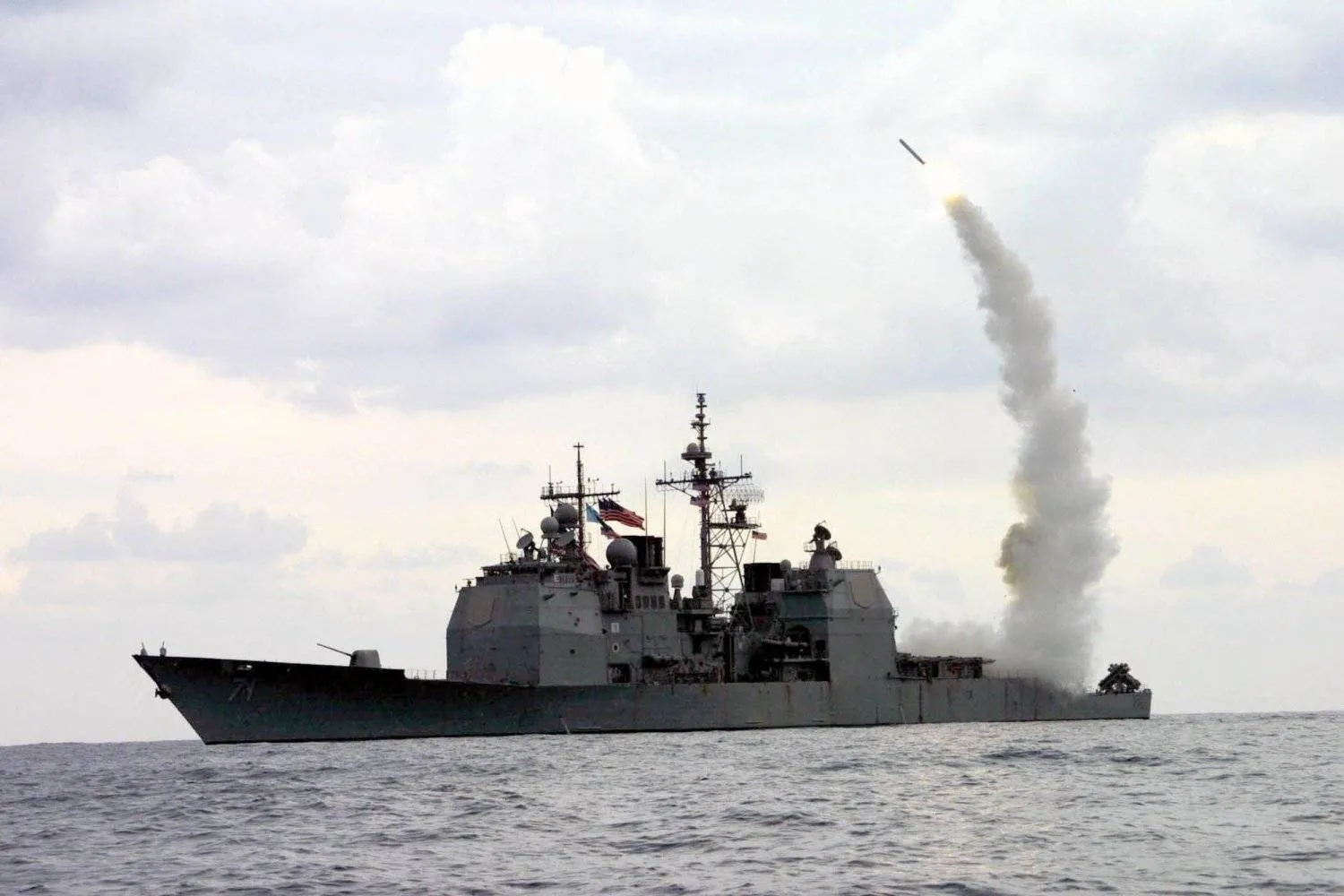Tomahawk cruise missiles launching from the guided missile cruiser USS Cape St. George in the Mediterranean Sea on March 23, 2003. (US Navy via AP/File)