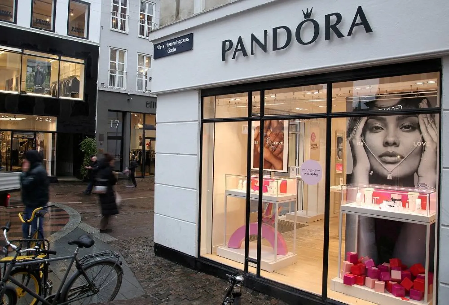People pass a shop of the Danish jewellery maker Pandora in central Copenhagen, Denmark February 6, 2024. (Reuters)