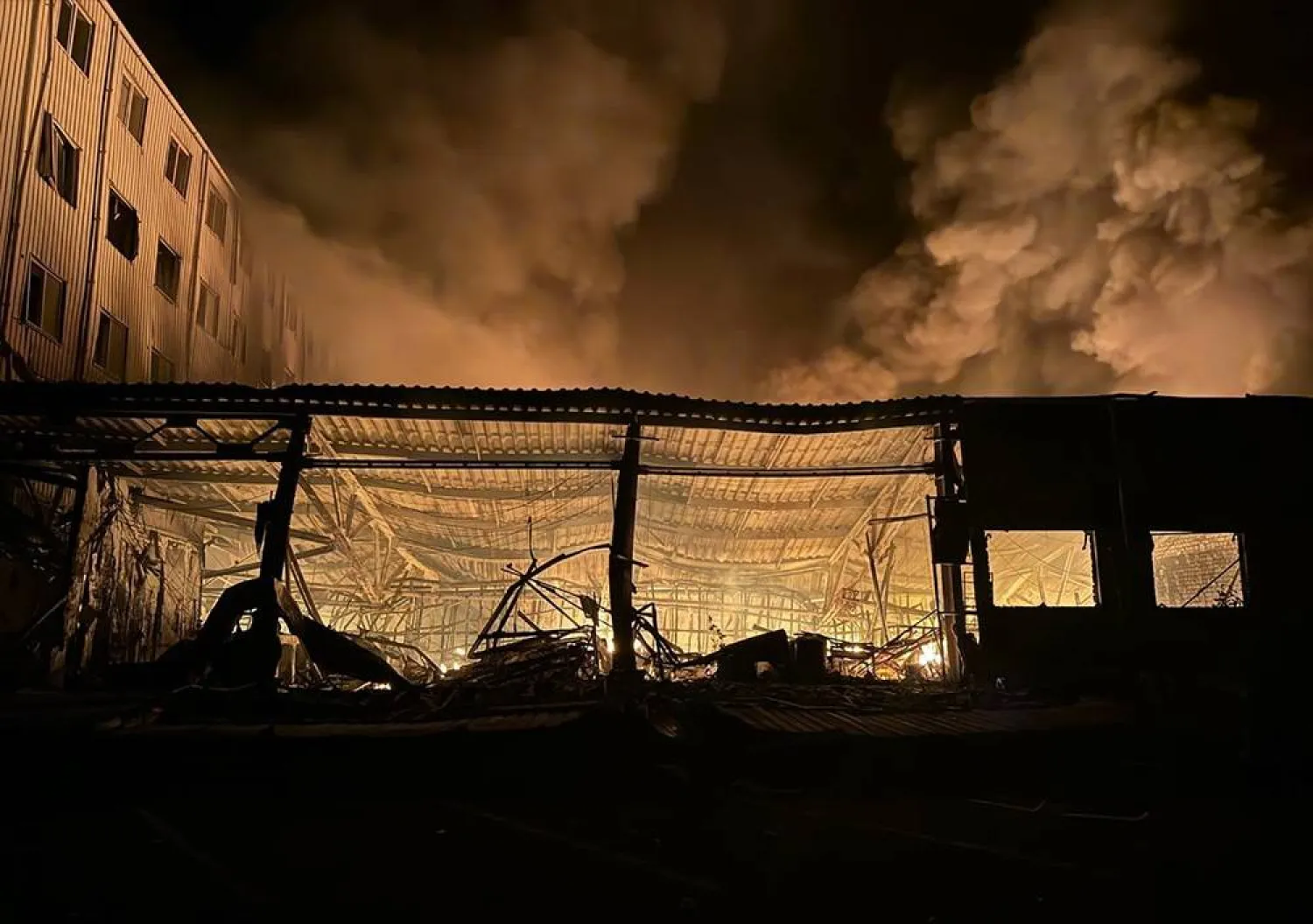 A handout picture made available by the Odesa Regional State Administration Oleh Kiper Telegram channel shows the storage site of the "Nova Poshta" postal service following a missile strike in Odesa, Ukraine, 29 April 2024. (EPA/Odesa Regional State Administration handout)