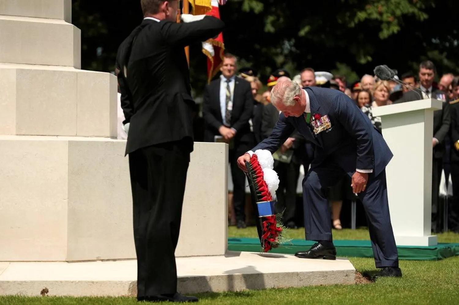 Britain's Prince Charles, Prince of Wales lays a wreath during the Royal British Legion's Service of Remembrance at the Commonwealth War Graves Cemetery in Bayeux for the 75th anniversary of D-Day, Normandy, northwestern France, June 6, 2019. (Reuters)