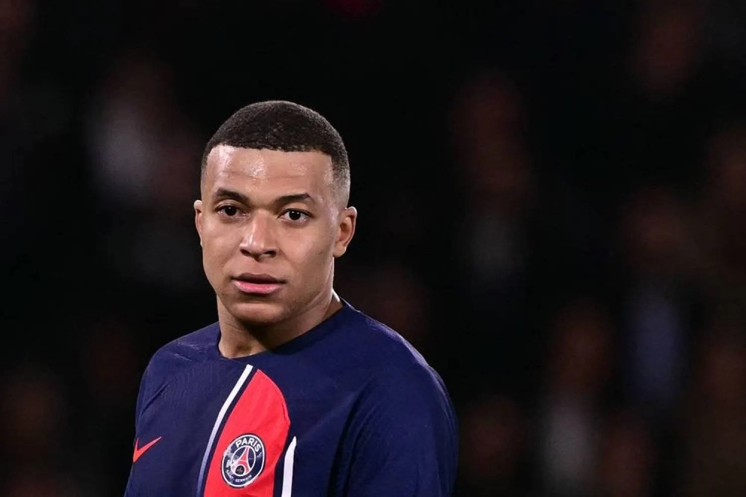 Paris Saint-Germain's French forward #07 Kylian Mbappe reacts during the UEFA Champions League quarter final first leg football match between Paris Saint-Germain (PSG) and FC Barcelona at the Parc des Princes stadium in Paris on April 10, 2024. (AFP)
