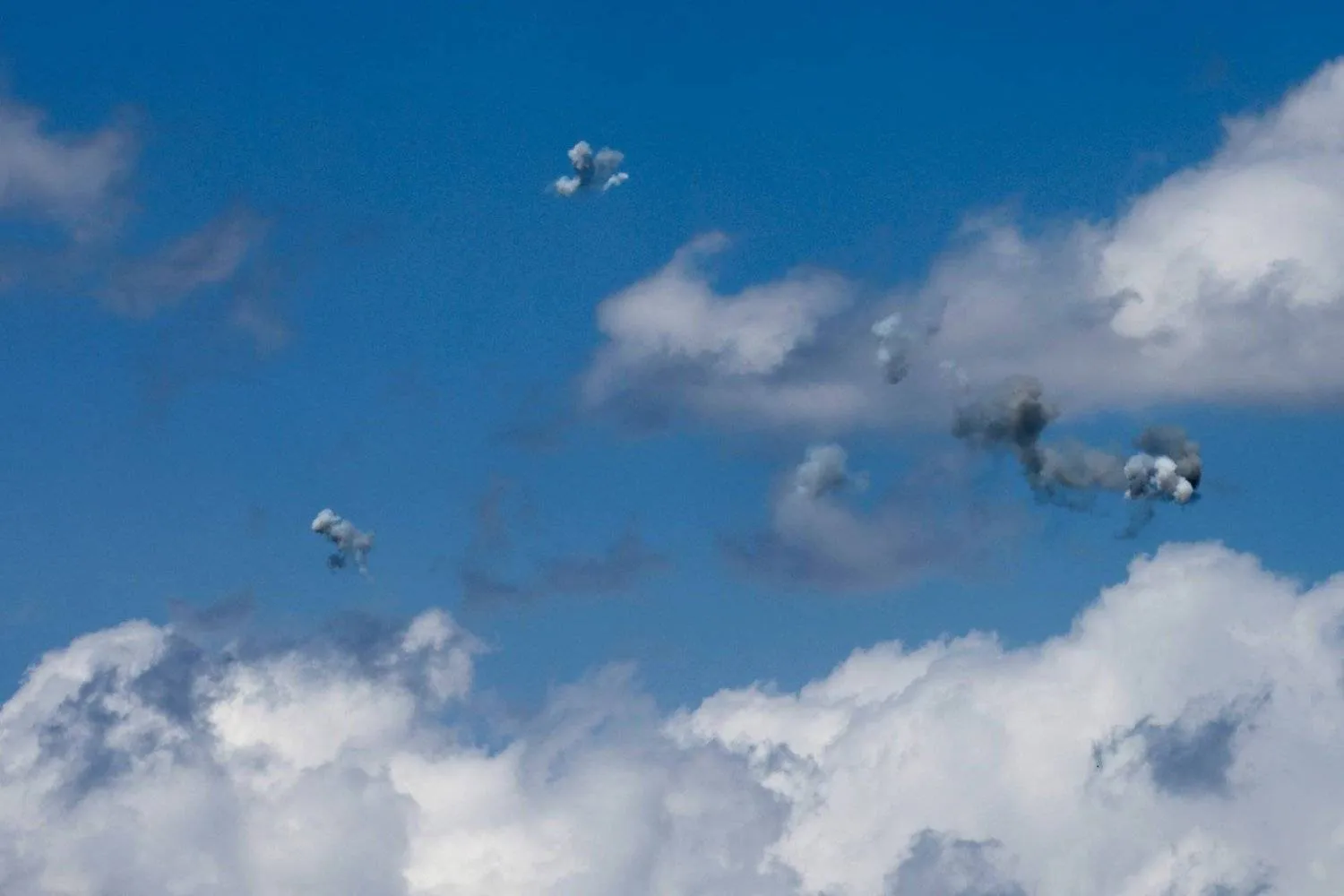 The Israeli Iron Dome air defense system intercepting missiles launched from southern Lebanon over northern Israel on Sunday (AFP) 