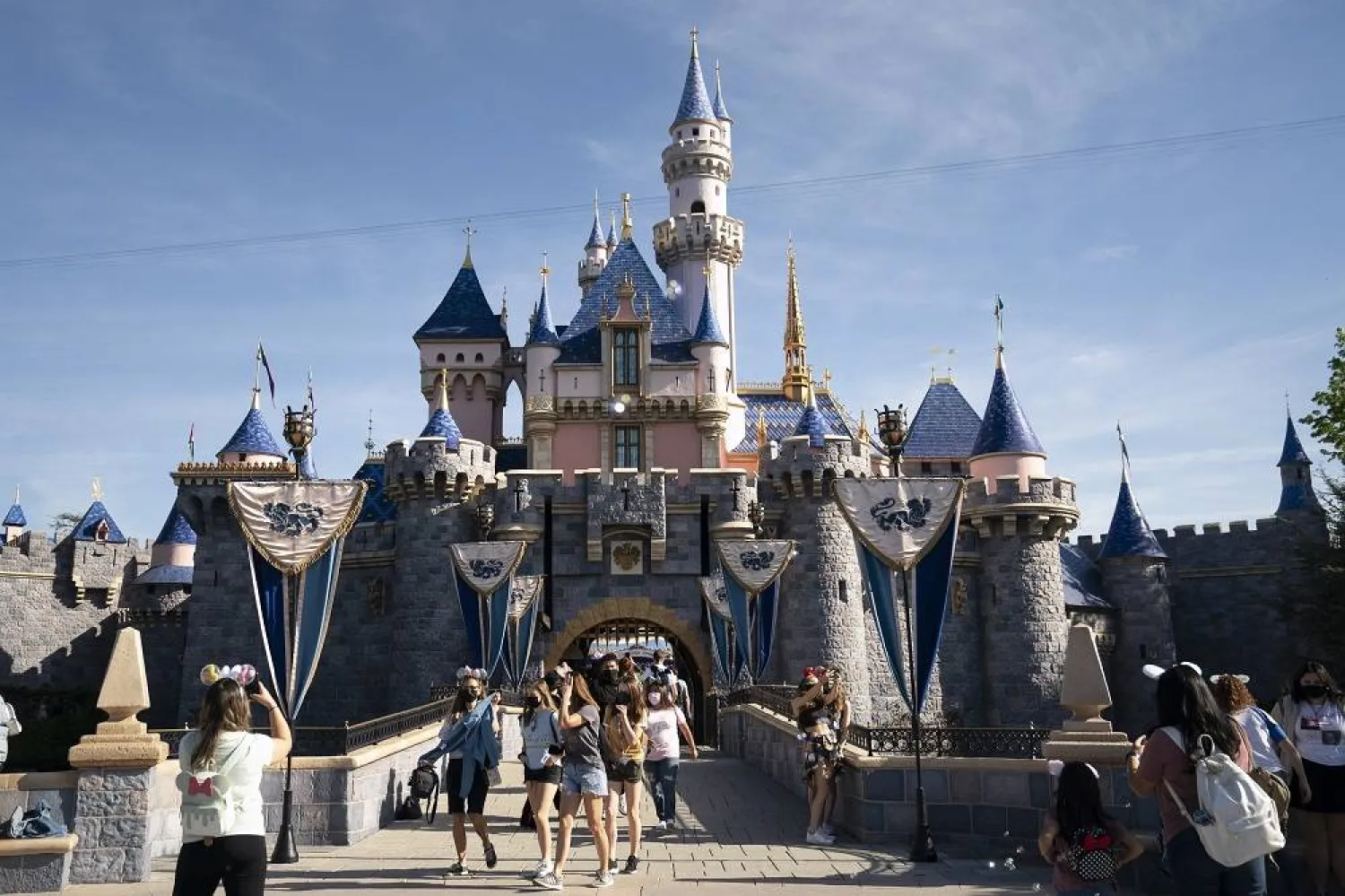Visitors pass through Disneyland in Anaheim, Calif., on April 30, 2021. (AP)