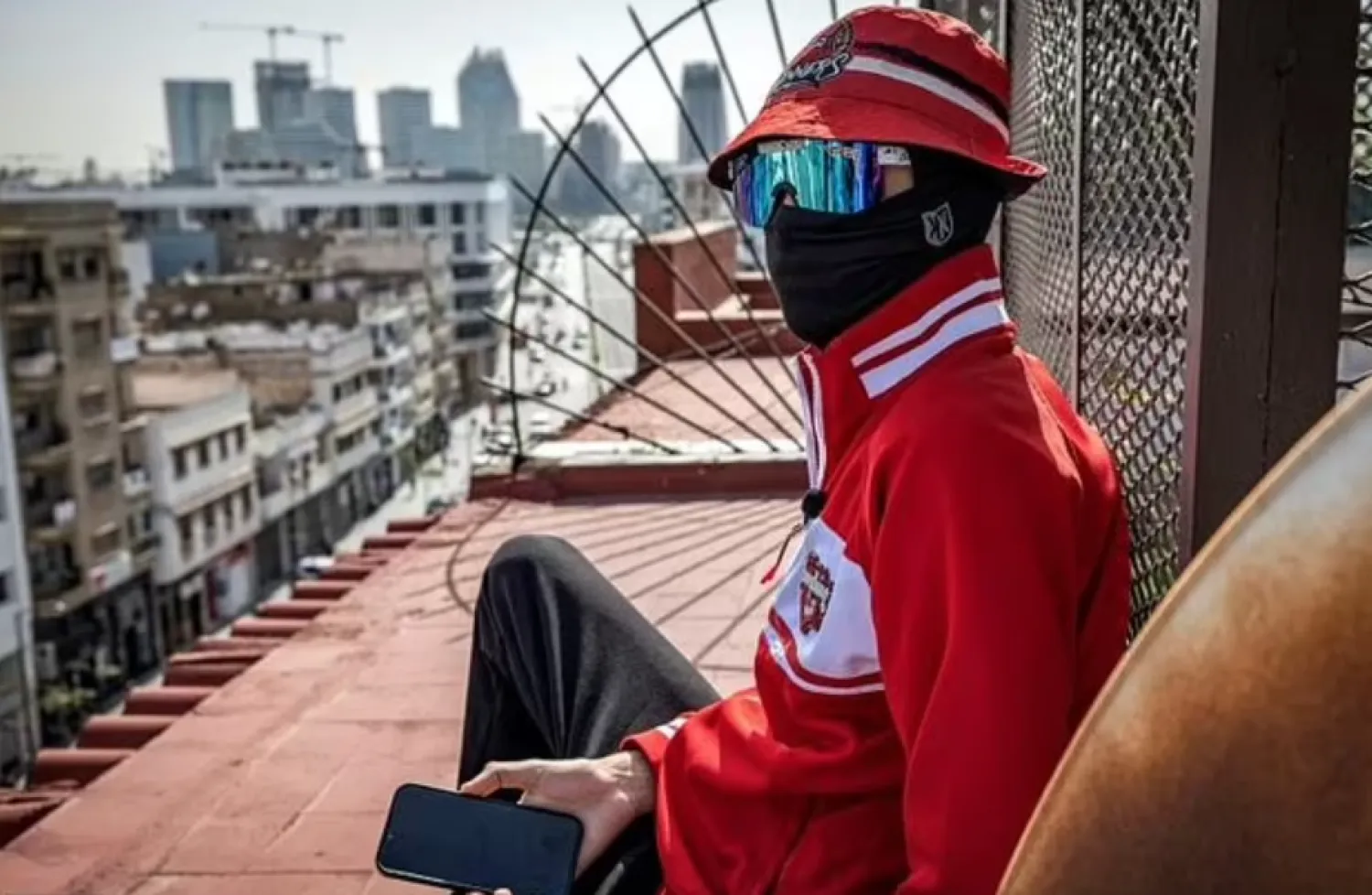 An ultra for Wydad AC football club in the old city of Casablanca, Morocco, where fans have been showing support for Palestinians - AFP