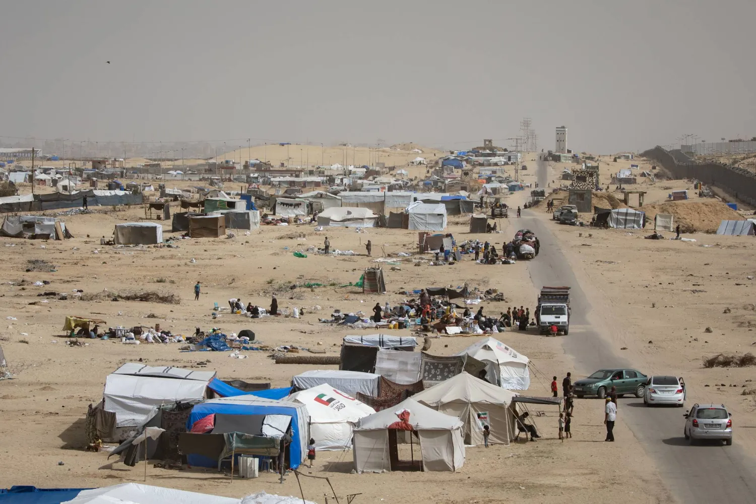 Internally displaced Palestinians prepare to leave with their belongings after an evacuation order issued by the Israeli army, near the Egyptian border in Rafah, southern Gaza Strip, 11 May 2024. EPA/HAITHAM IMAD