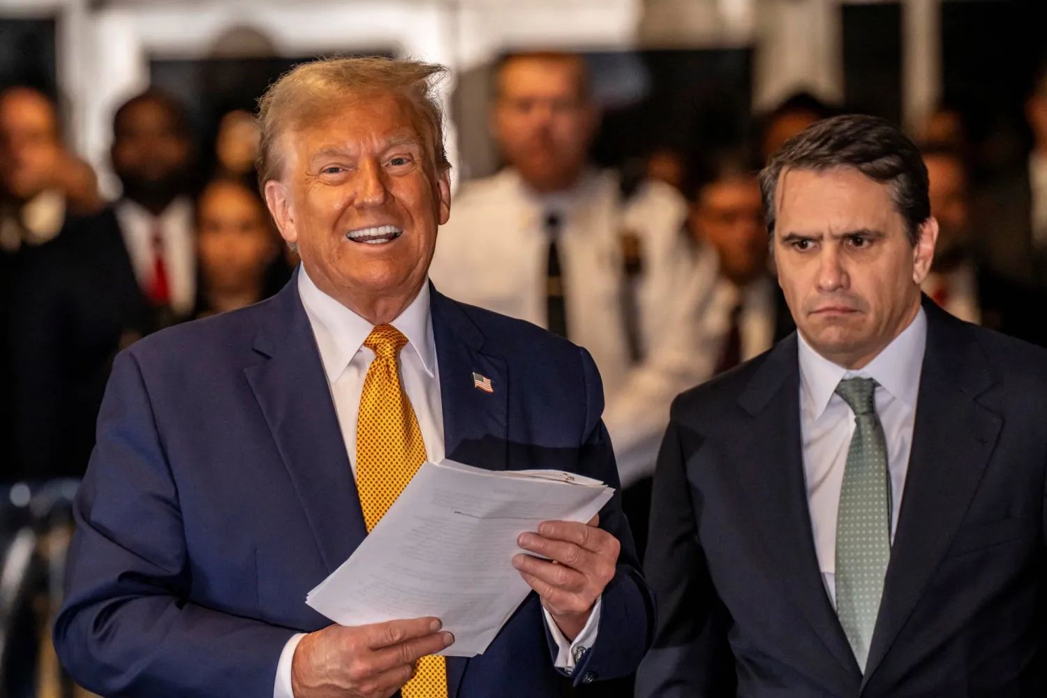 Former US President Donald Trump speaks with members of the media as attorney Todd Blanche listens outside the Manhattan Criminal Court on May 14, 2024, in New York City, US Mark Peterson/Pool via REUTERS