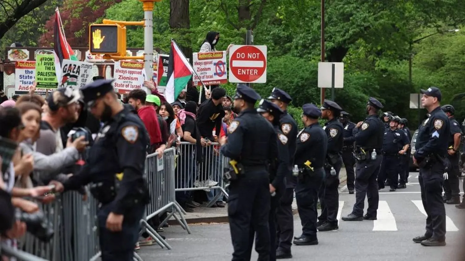 NYPD officers block off pro-Palestinian demonstrators near the Met Gala being held at the Metropolitan Museum of Art in New York City. (AFP via Getty Images) 