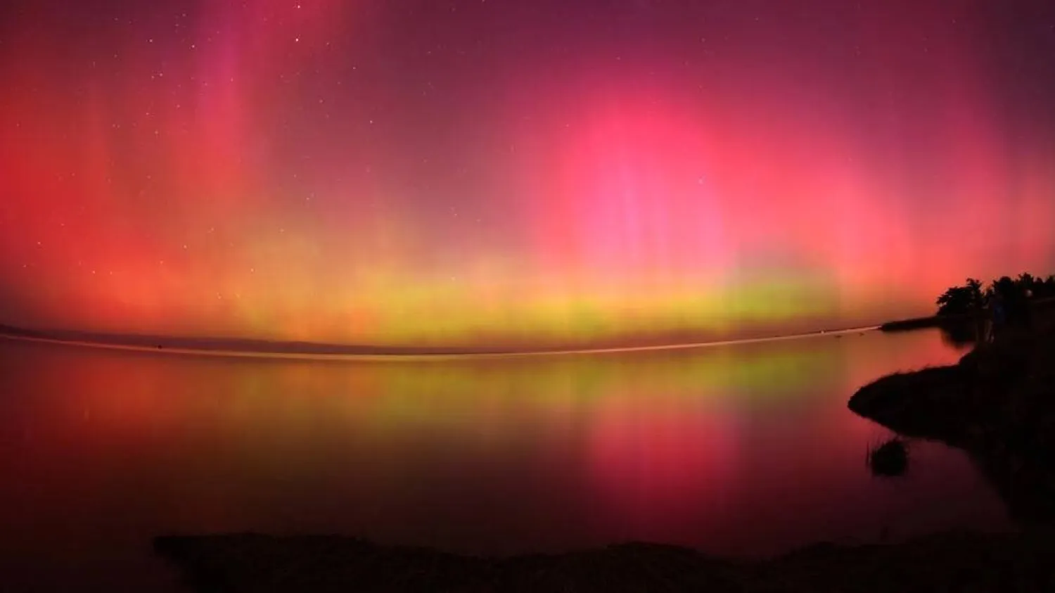 Auroras may be pretty, but the solar storms that cause them can cause serious havoc on Earth, scientists have warned. Sanka Vidanagama / AFP/File
