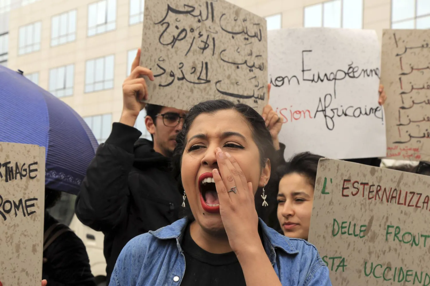 Activists demonstrate outside the delegation of the European Union to Tunisia against migrant deals with EU, in the capital Tunis, Thursday, May 9, 2024. (AP Photo/Anis Mili)