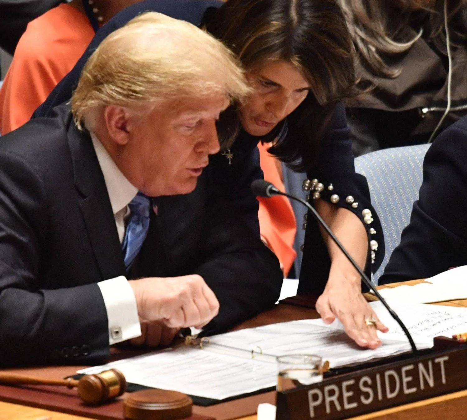 Former US President Donald Trump talking with former Former US Ambassador to the United Nations Nikki Haley during a Security Council session in September 2018 (AFP)