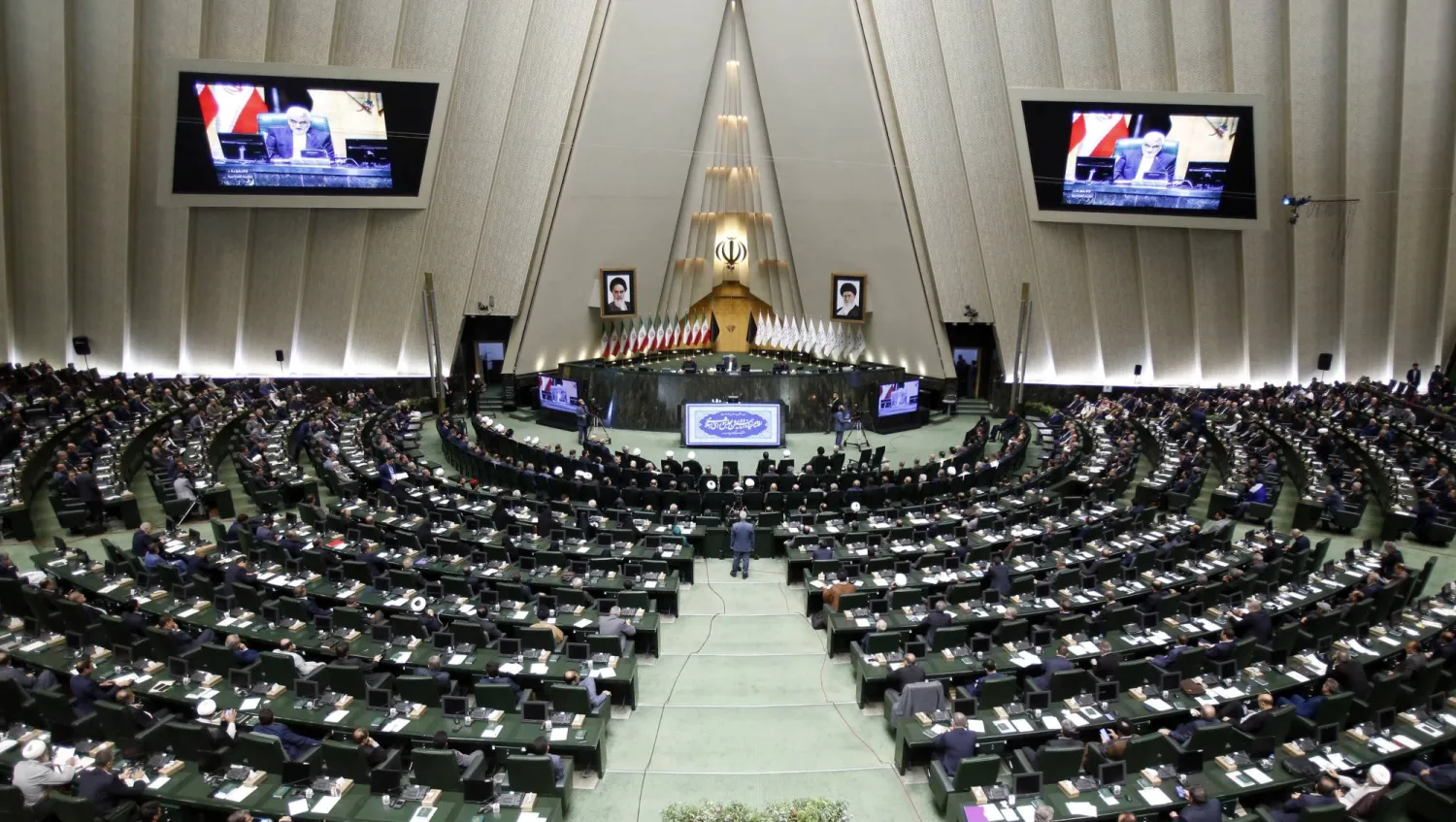 Iranian lawmakers attend the New Iranian parliament inauguration ceremony at the parliament in Tehran, Iran, 27 May 2024. EPA/ABEDIN TAHERKENAREH