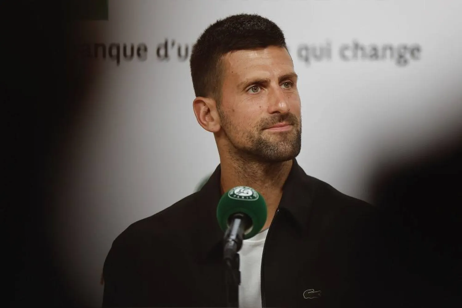 Serbia's Novak Djokovic listen to a question during a press conference ahead his first round match of the French Open tennis tournament at the Roland Garros stadium in Paris, Sunday, May 26, 2024. (AP)