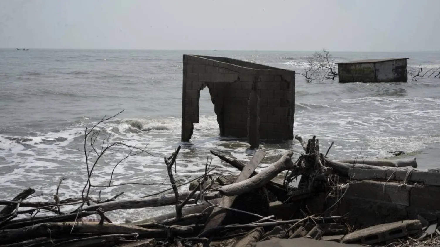Homes destroyed by the sea are seen in the community of El Bosque in southern Mexico. Yuri CORTEZ / AFP
