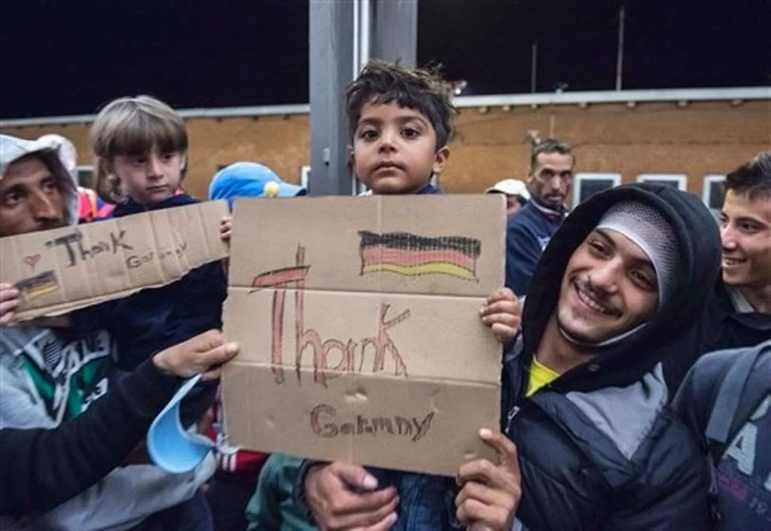 Refugees arrive at train station in Germany (AFP)
