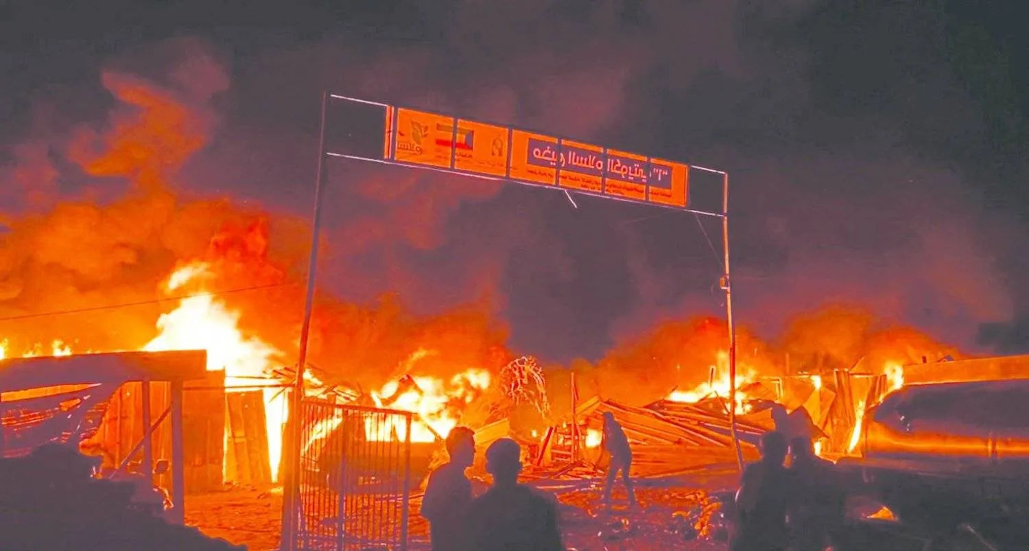 Fire breaks out among the tents of displaced people that were subjected to Israeli bombing in Rafah (Reuters)