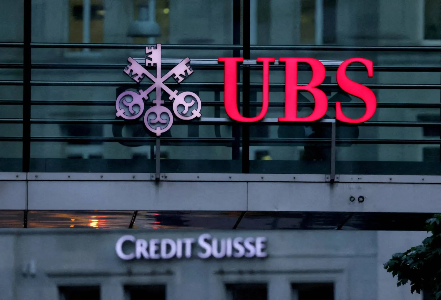 Logos of Swiss banks Credit Suisse and UBS are seen before a news conference in Zurich Switzerland, August 30, 2023. REUTERS/Denis Balibouse/File Photo Purchase Licensing Rights