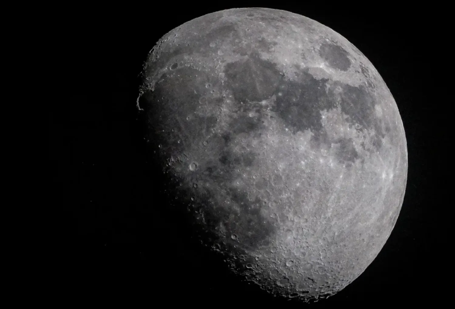 Scientists say a lunar time scale is needed before astronauts return to the moon, seen in the sky in the evening hours in Kars, Turkey, on May 18. Omer Tarsuslu/Anadolu/Getty Images
