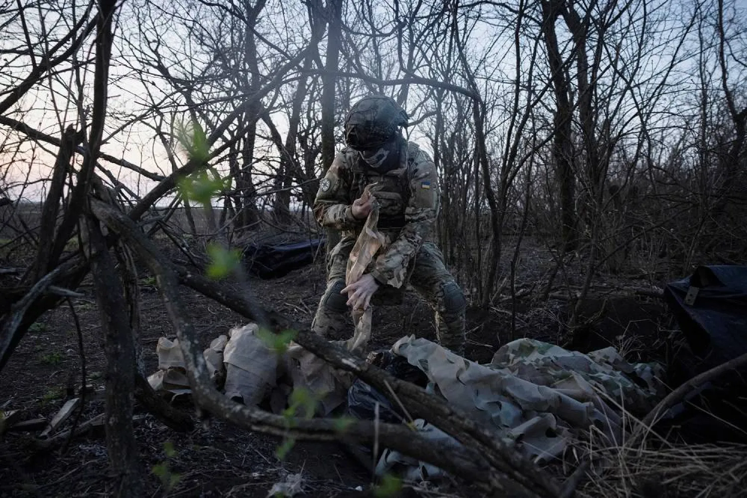 A member of a drone unit of Ukraine's 58th Motorized Brigade unpacks equipment near the front line in the Donetsk region, amid Russia’s attack on Ukraine, Ukraine April 9, 2024. (Reuters)