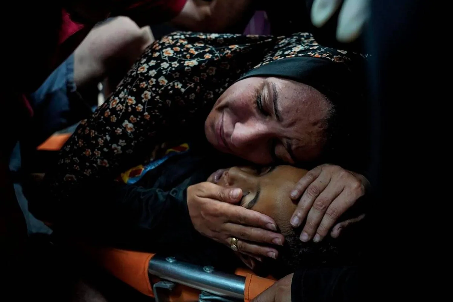  Palestinian woman mourns her child, Mahmoud Essa, 12, who was killed during Israeli bombardment, in Deir al-Balah, Gaza. (SAHER ALGHORRA/AP)