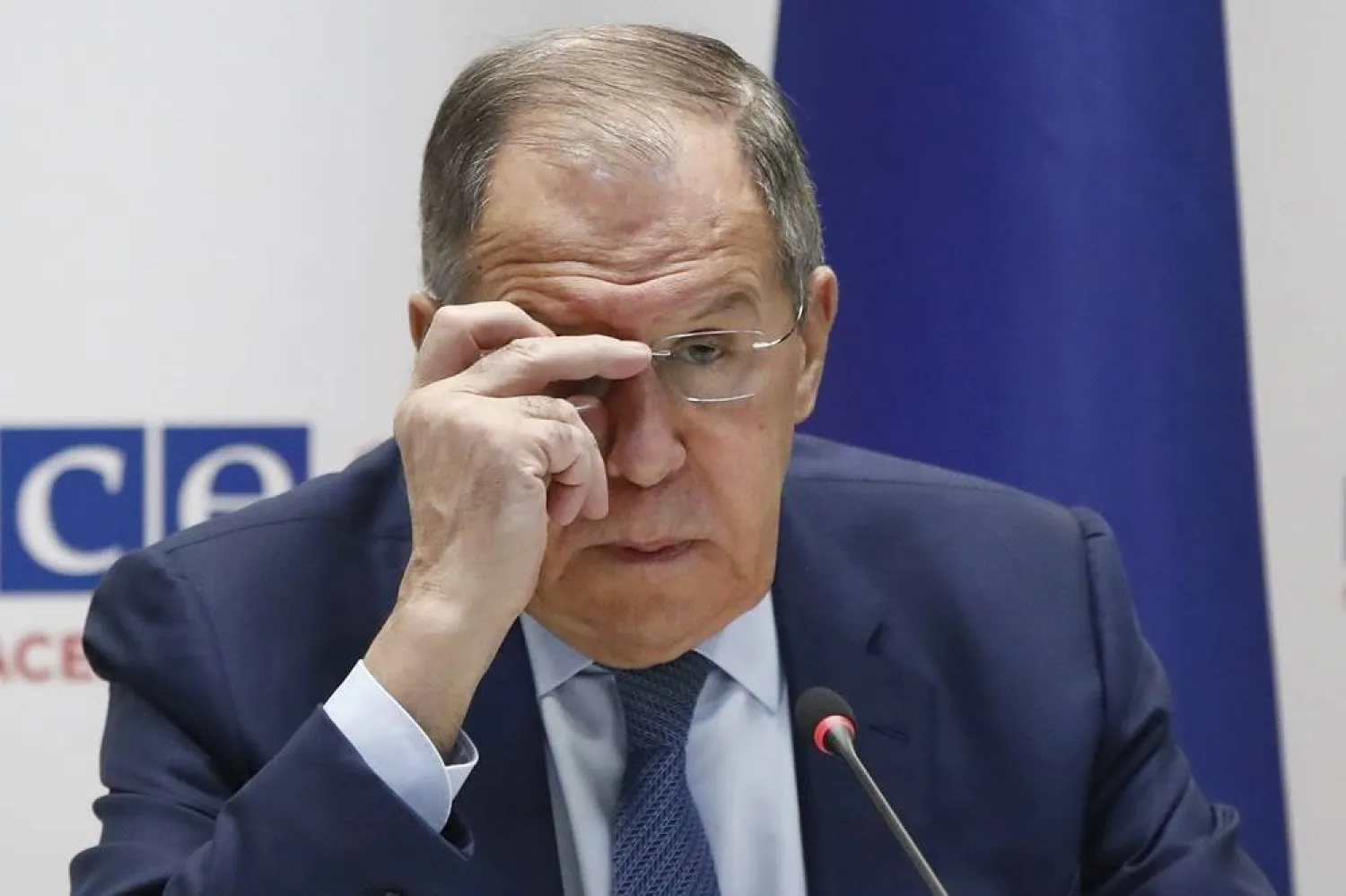 Russia's Foreign Minister Sergei Lavrov adjusts the glasses during his news conference at the time of the OSCE (Organization for Security and Co-operation in Europe) Ministerial Council meeting, in Skopje, North Macedonia, on Dec. 1, 2023. (AP)