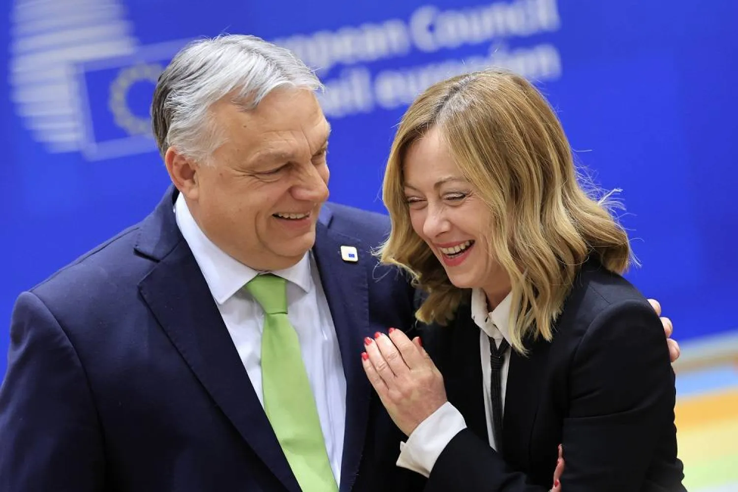 Hungary's Prime Minister Viktor Orbán, left, speaks with Italy's Premier Giorgia Meloni during a round table meeting at an EU Summit in Brussels, on March 21, 2024. (AP)