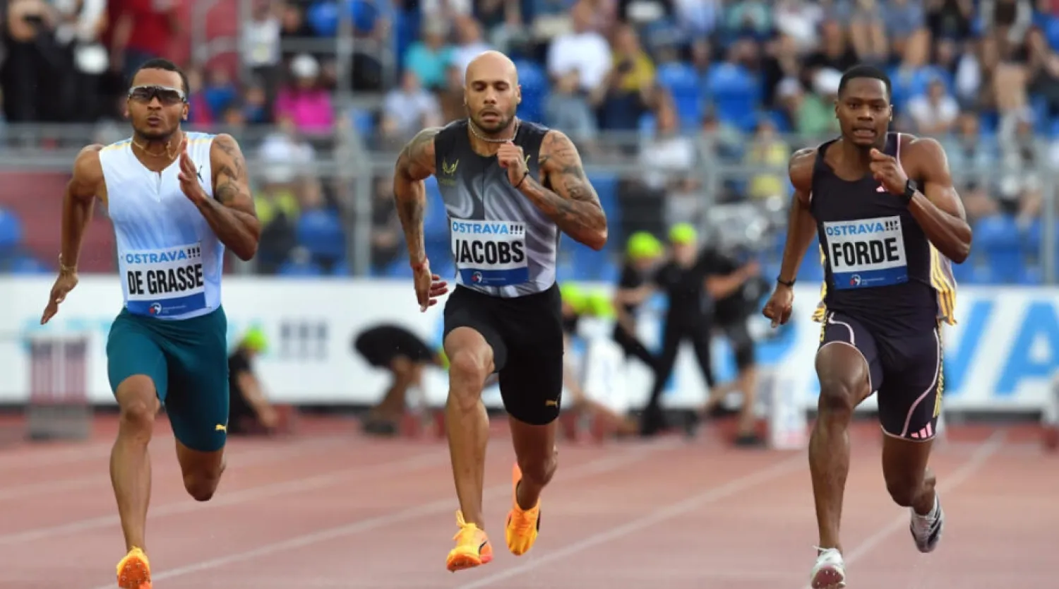 Italy's Lamont Marcell Jacobs (C) will be in the spotlight in Rome © Michal Cizek / AFP
