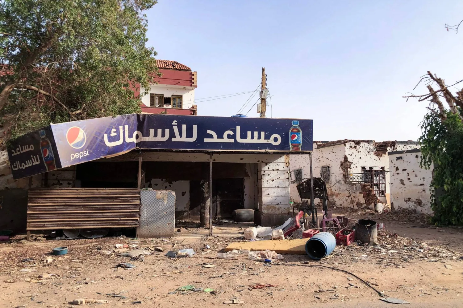 This picture taken on May 30, 2024, shows a damaged shop in Omdurman. (Photo by AFP)
