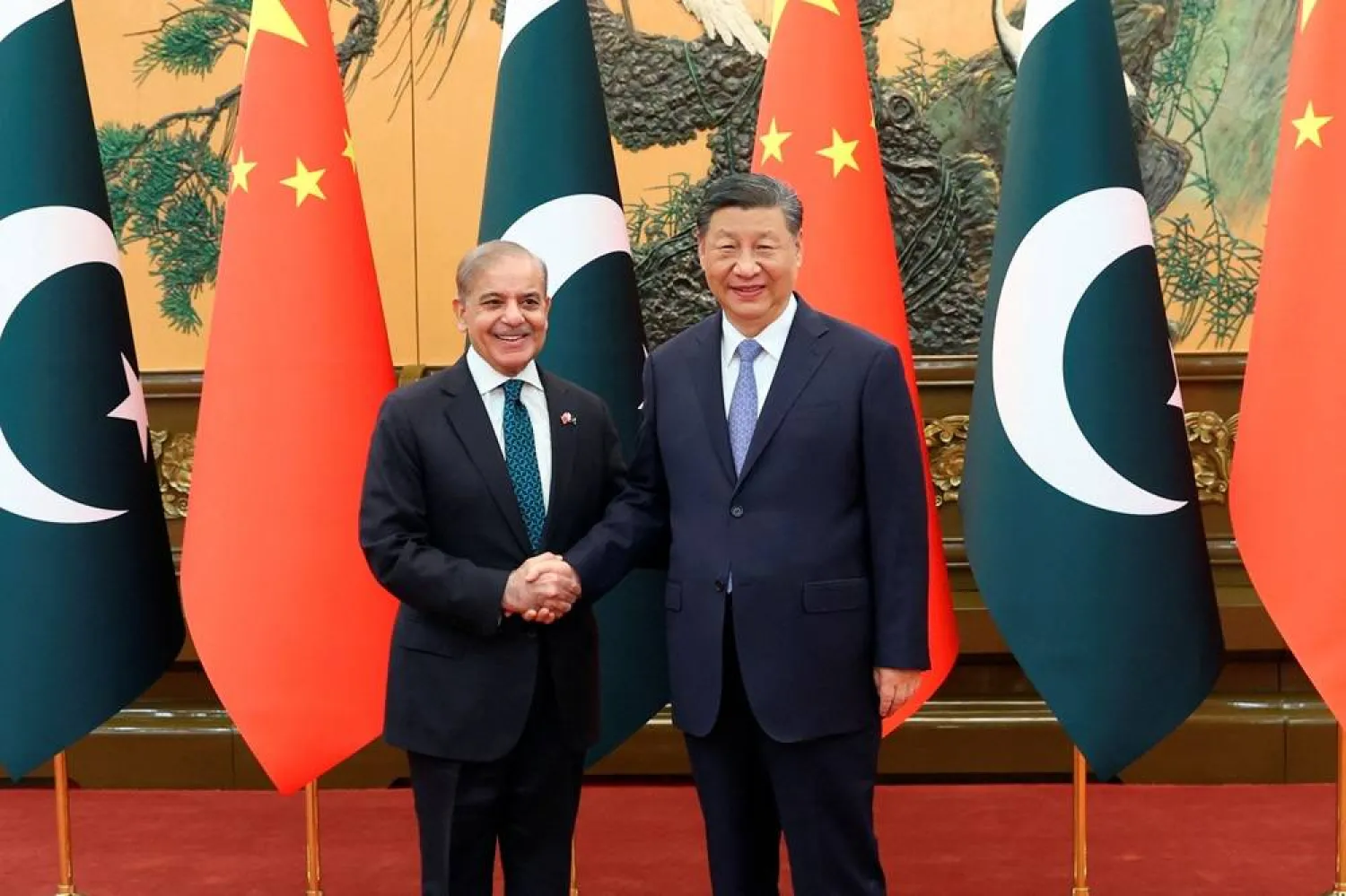  Chinese President Xi Jinping and Pakistani Prime Minister Shehbaz Sharif shake hands at the Great Hall of the People in Beijing, China June 7, 2024. (China Daily via Reuters)