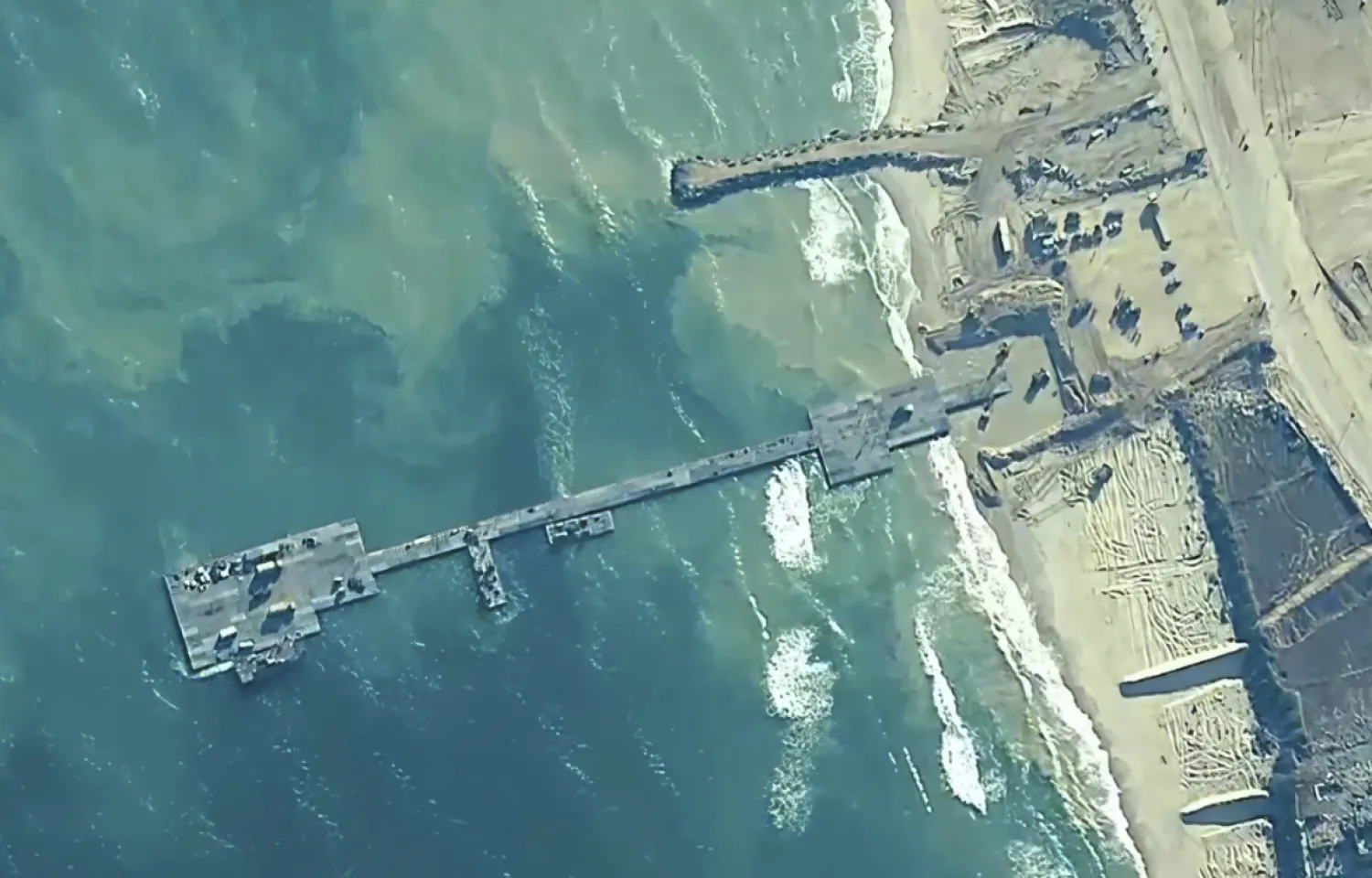 The pier constructed by the US military was operational for only about a week before it was blown apart in high winds - The AP