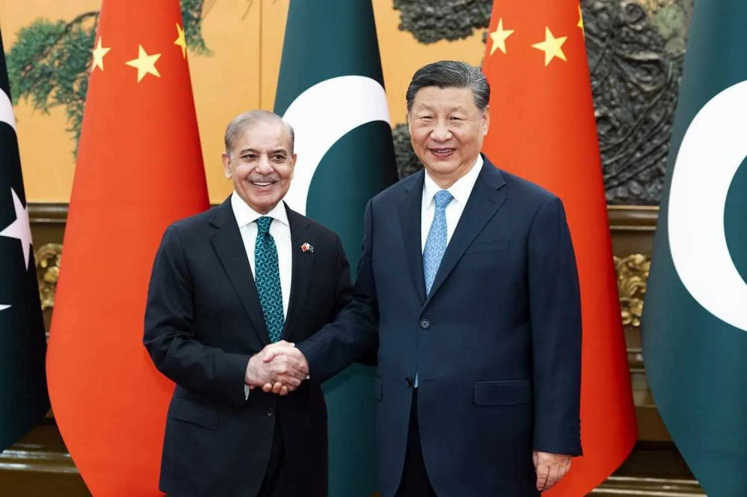  In this photo released by Xinhua News Agency, Chinese President Xi Jinping meets with Pakistani Prime Minister Shehbaz Sharif at the Great Hall of the People in Beijing, Friday, June 7, 2024. (Huang Jingwen/Xinhua via AP) 