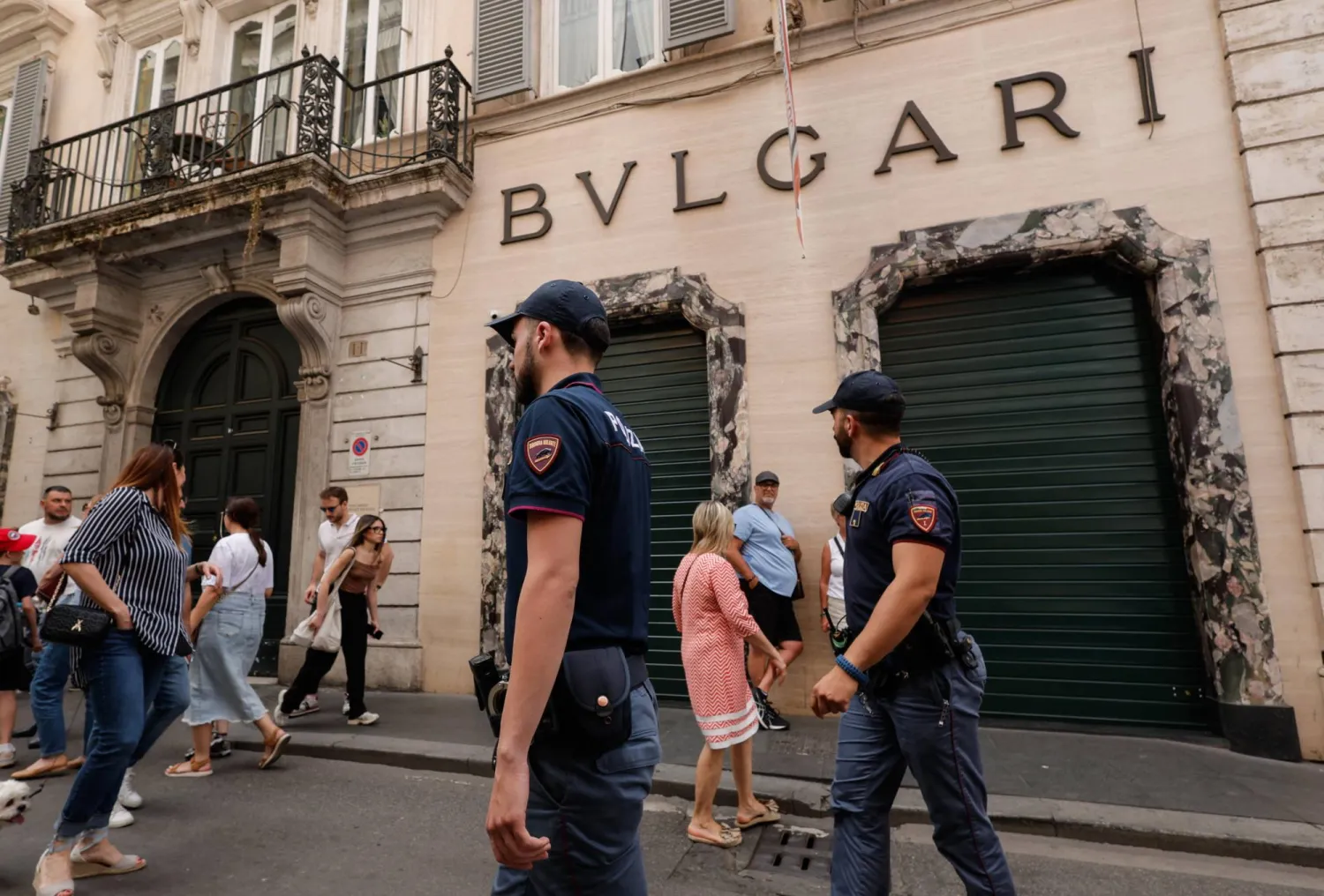Police officers stand outside the Bulgari store in via Condotti, after a theft worth 500,000 euros was carried out during the night in Rome, Italy, 09 June 2024. EPA/GIUSEPPE LAMI