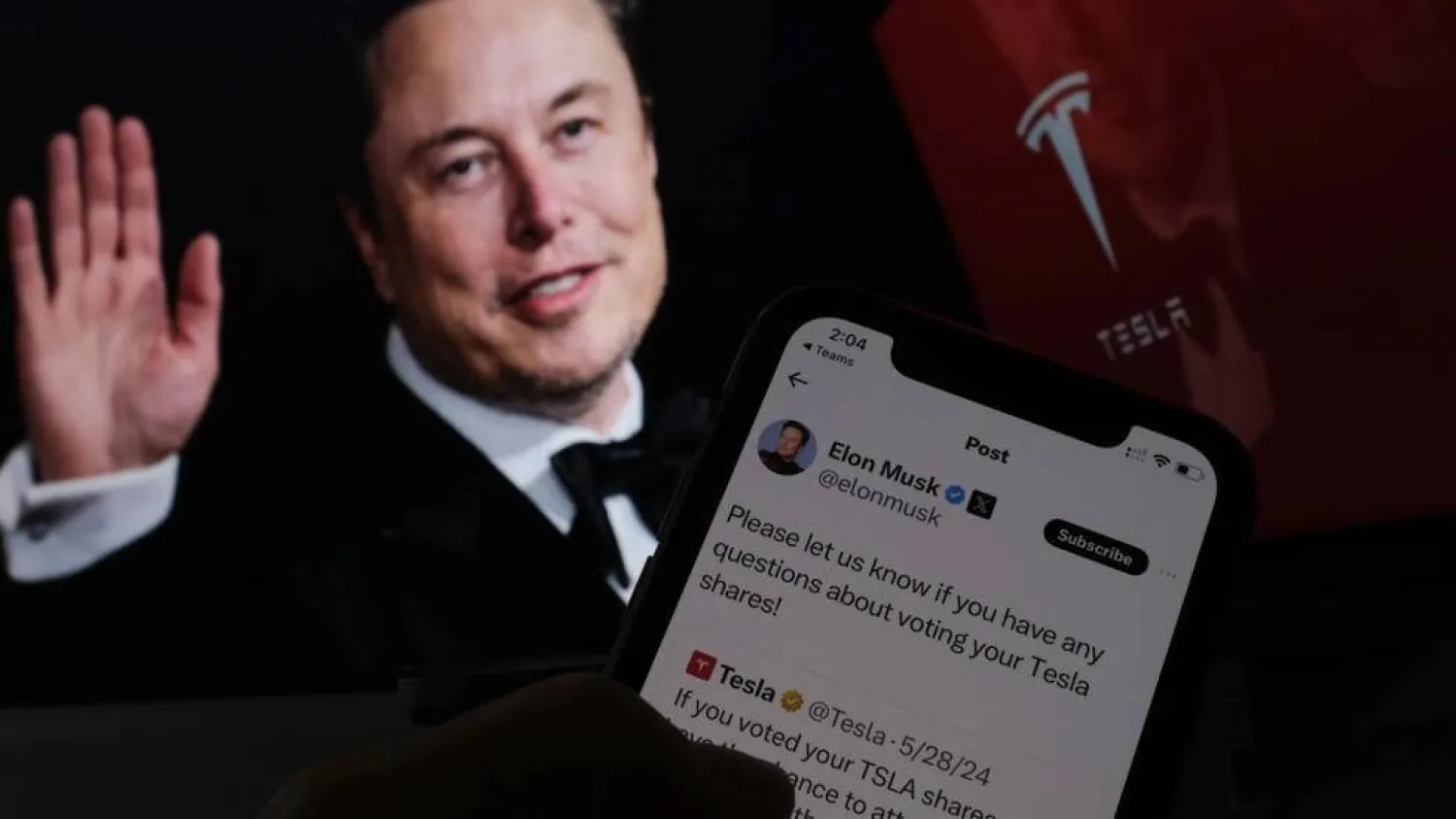 Tech billionaire Elon Musk is encouraging shareholders in electric automaker Tesla to vote in favor of a plan that includes a massive pay package for the company's founder and chief executive. Chris DELMAS / AFP
