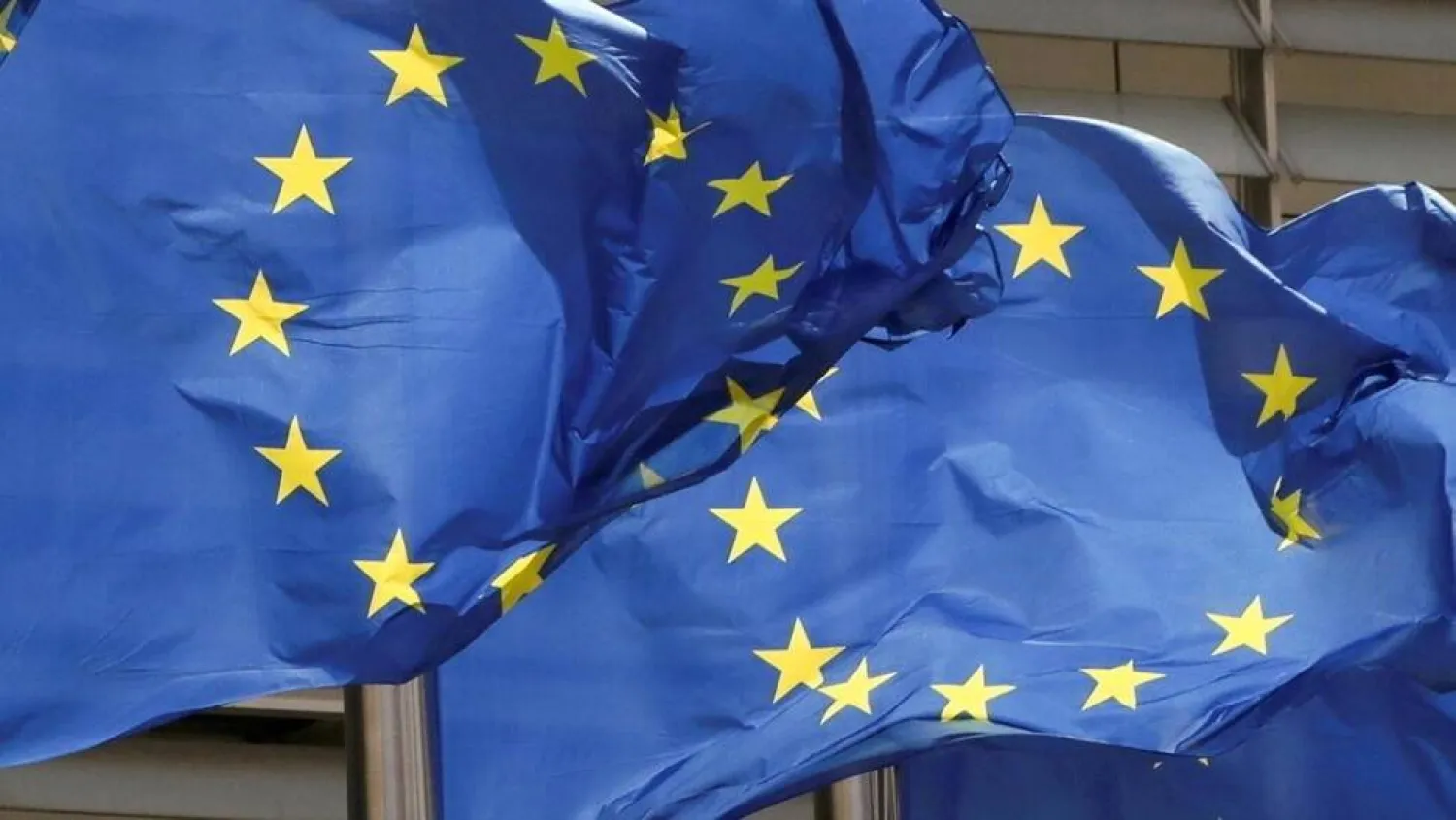 European Union flags flutter outside the EU Commission headquarters in Brussels, Belgium May 5, 2021. Yves Herman, Reuters