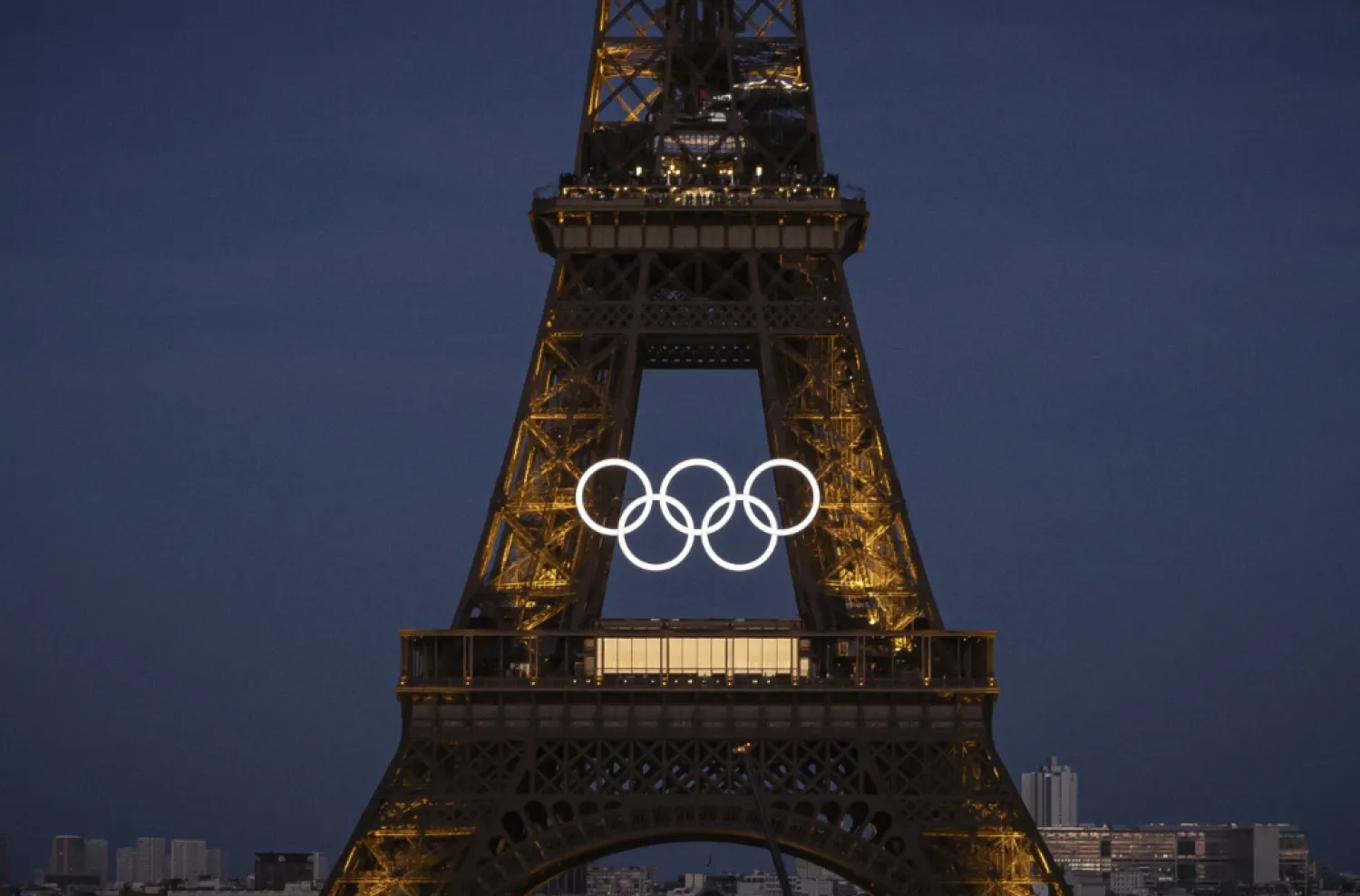 The Olympic ring seen on Eiffel Tower, June 7 2024 - AP