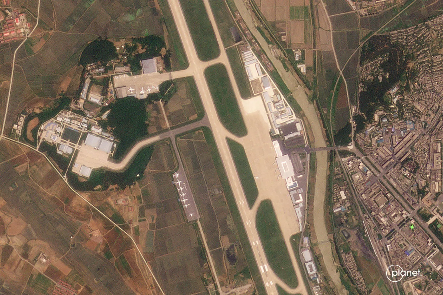 This handout image from Planet Labs PBC taken on June 11, 2024 and received on June 12, 2024 shows a view of the Pyongyang International Airport in Pyongyang. (Photo by Handout / Planet Labs PBC / AFP) 