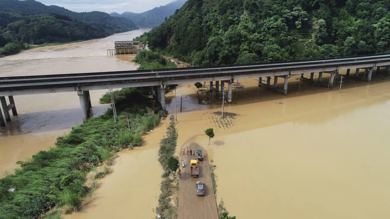 In this photo released by Xinhua News Agency, an aerial drone photo taken on June 16, 2024 shows a flooded area in Dongping Township of Zhenghe County, Nanping City in southeastern China's Fujian Province. (Huang Jiemin/Xinhua via AP