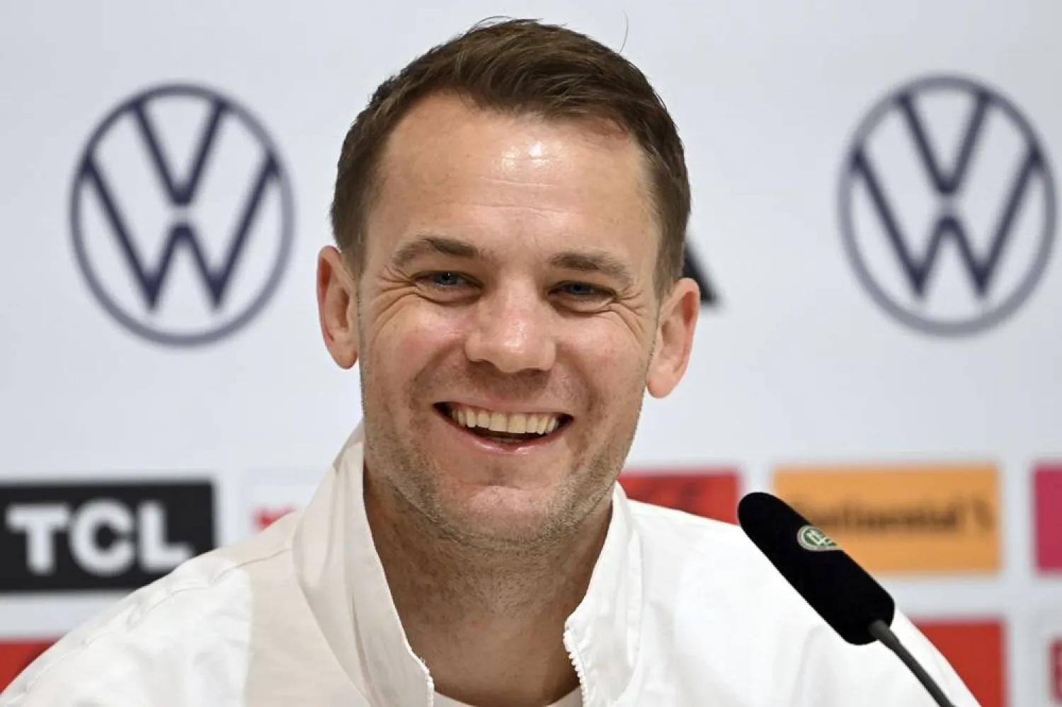 Germany's goalkeeper Manuel Neuer smiles during press conference of the German national soccer team in Herzogenaurach, Germany, Monday, June 17, 2024. (dpa via AP) 