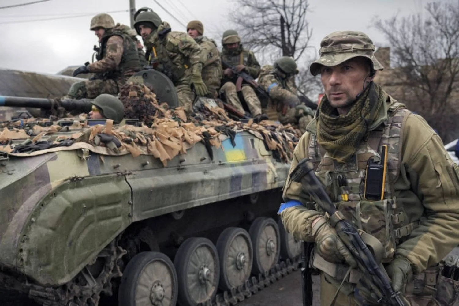 A Ukrainian soldier standing next to a military vehicle. (AP)
