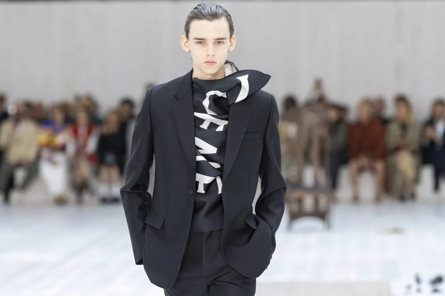 A model presents a creation for the Spring/Summer 2025 Menswear Collection by British designer Jonathan Anderson for Loewe fashion house during the Paris Fashion Week, in Paris, France, 22 June 2024. (EPA) 