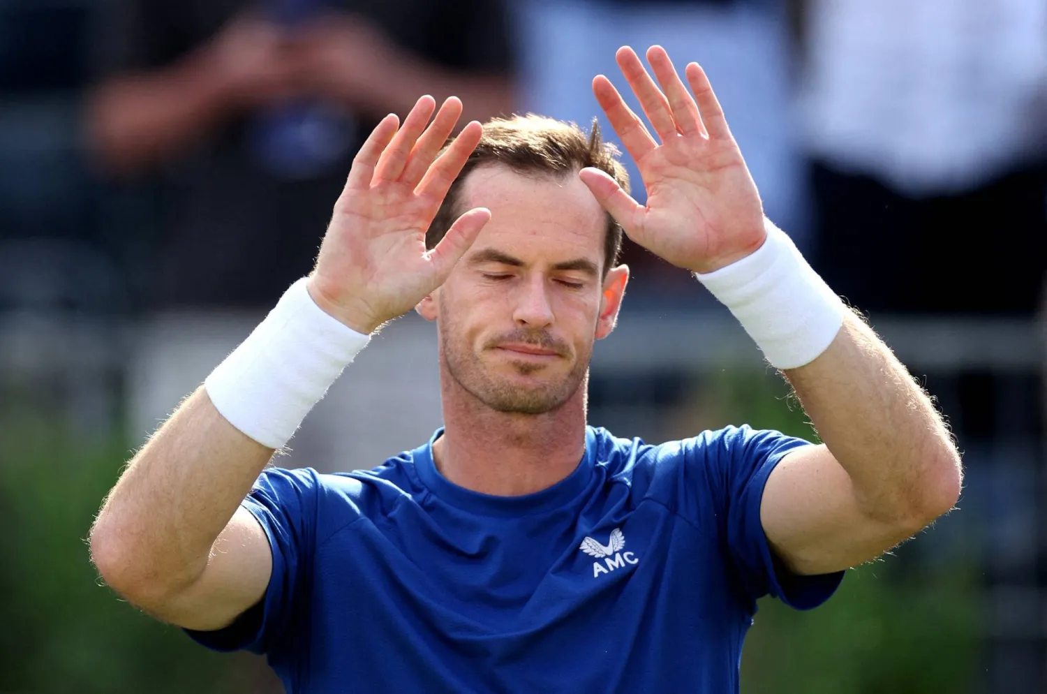 FILE PHOTO: Tennis - Queen's Club Championships - The Queen's Club, London, Britain - June 19, 2024 Britain's Andy Murray salutes the spectators after retiring due to injury in his men's singles second match against Australia's Jordan Thompson Action Images via Reuters/Paul Childs/File Photo