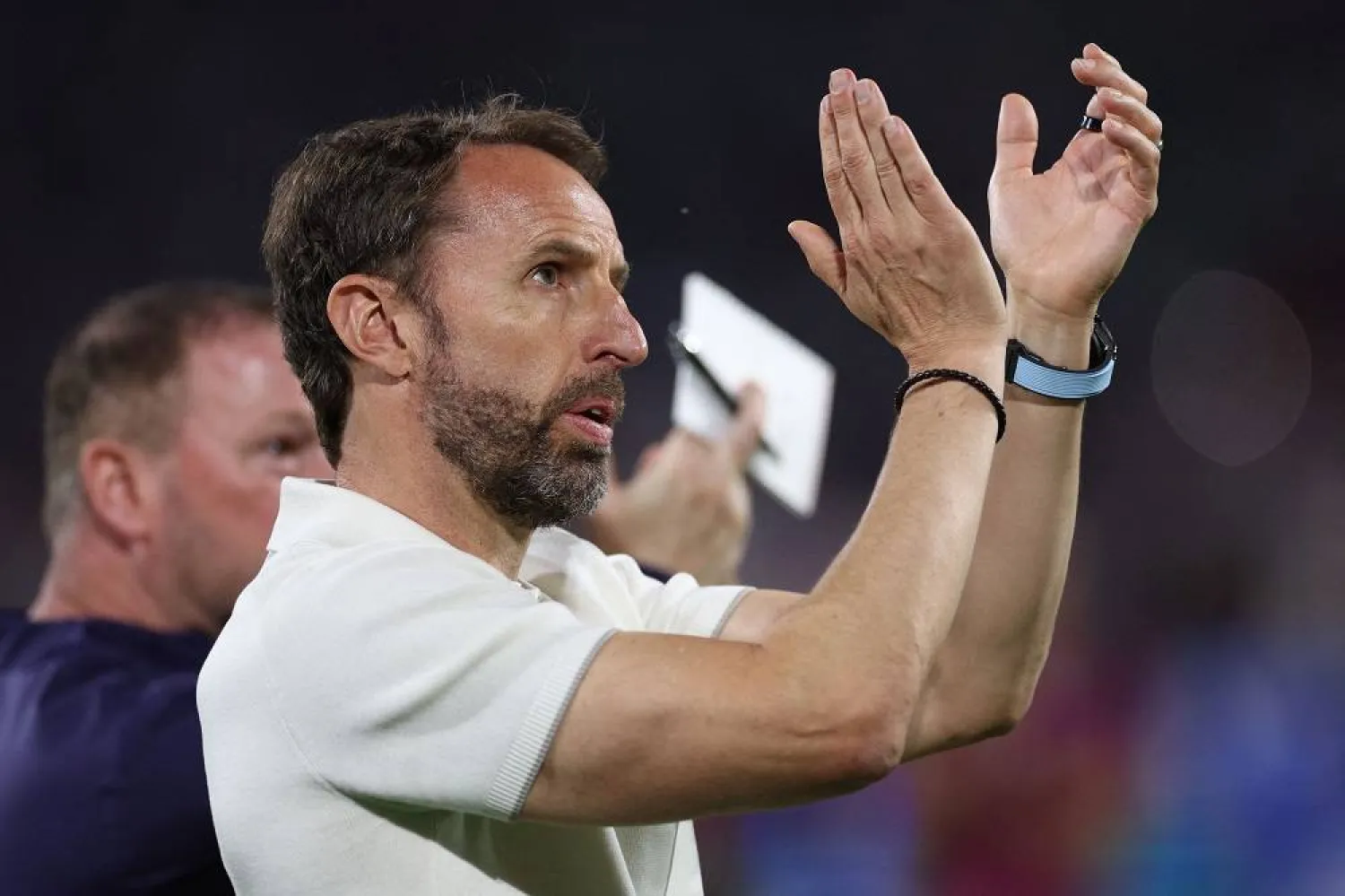 England's head coach Gareth Southgate gestures to fans after the UEFA Euro 2024 Group C football match between England and Slovenia at the Cologne Stadium in Cologne on June 25, 2024. (AFP)