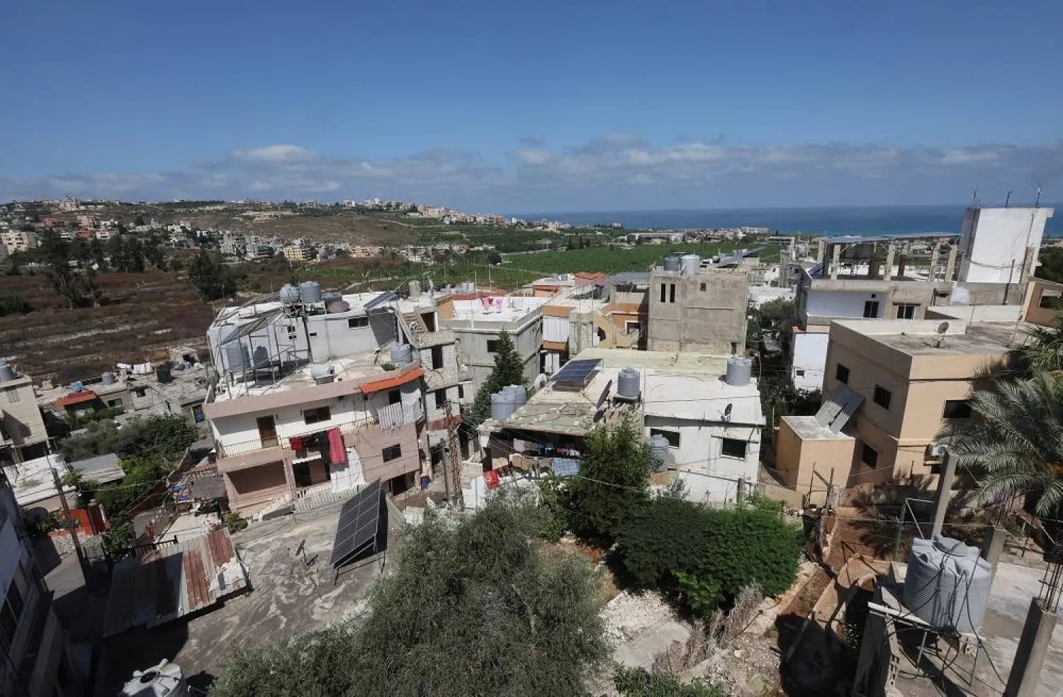 A view shows buildings in Baisariyeh, southern Lebanon June 25, 2024. (Reuters)