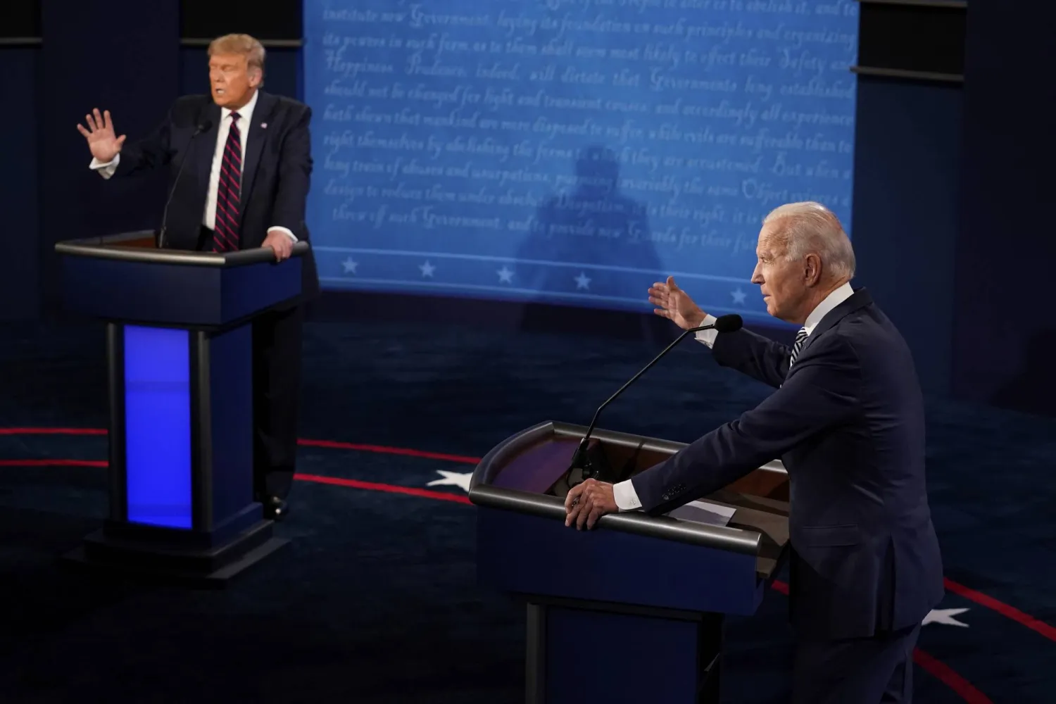 FILE - President Donald Trump and Democratic presidential candidate former Vice President Joe Biden debate during their first presidential debate at Case Western University and Cleveland Clinic, in Cleveland, Sept. 29, 2020. (AP Photo/Morry Gash, Pool, File)