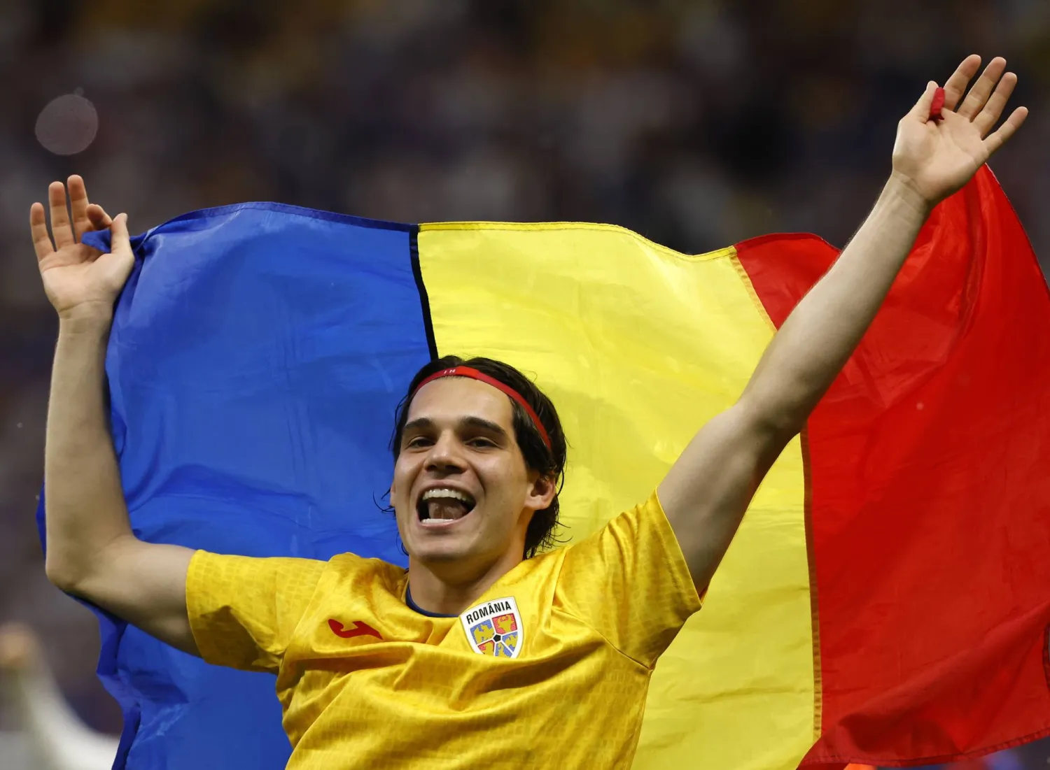 هاجي محتفلاً ببلوغ دور الـ16 في كأس أمم أوروبا (إ.ب.أ)