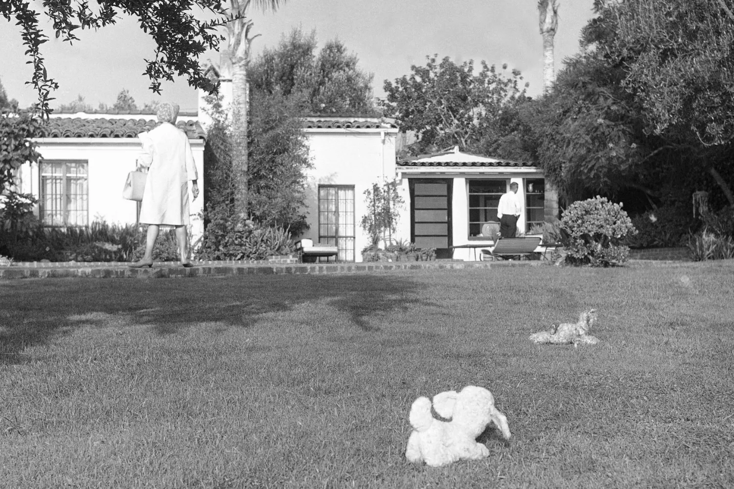 FILE - The backyard of the home where Marilyn Monroe lived is shown after she was found dead in Hollywood, August 5, 1962. (AP Photo/Harold Filan, File)