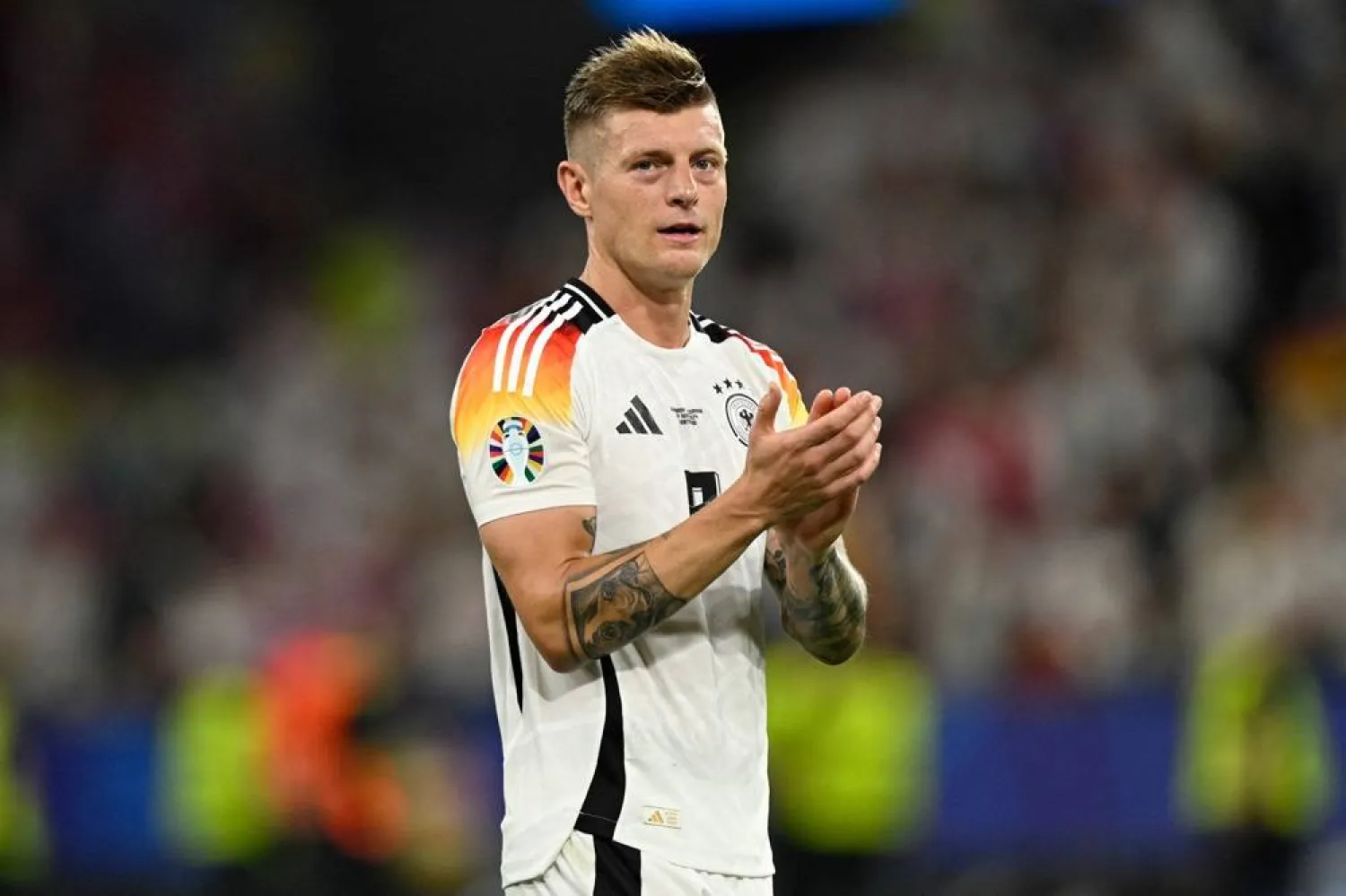  Germany's midfielder #08 Toni Kroos celebrates his team's win at the end of the UEFA Euro 2024 round of 16 football match between Germany and Denmark at the BVB Stadion Dortmund in Dortmund on June 29, 2024. (AFP)