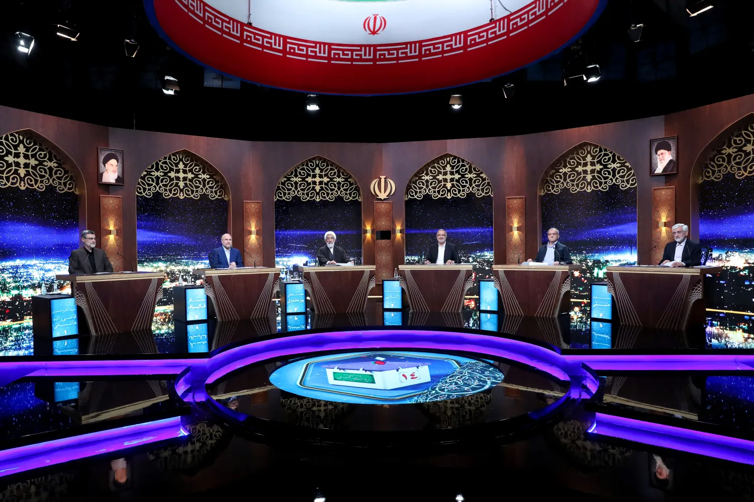 Iranian presidential candidates attend an election debate at a television studio in Tehran, Iran June 20, 2024. Morteza Fakhri Nezhad/IRIB/WANA (West Asia News Agency)/Handout via REUTERS