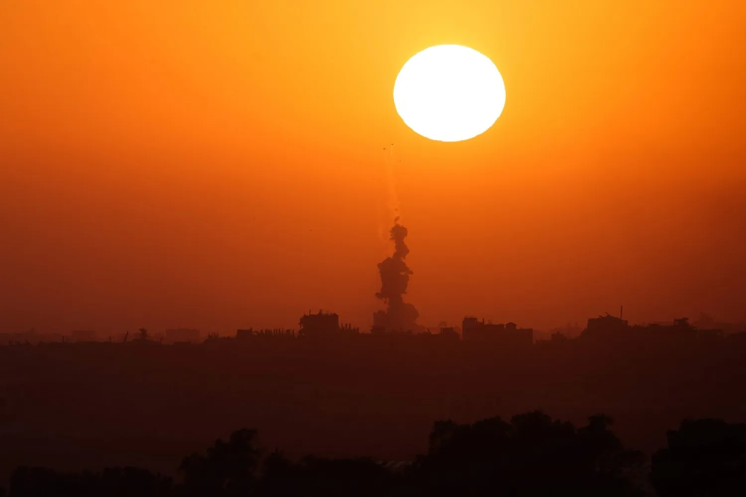 This picture taken from Israel's southern border with the Gaza Strip shows smoke billowing in the Palestinian territory at sunset following Israeli bombardment on June 2, 2024, amid the ongoing conflict between Israel and Hamas. (AFP) 