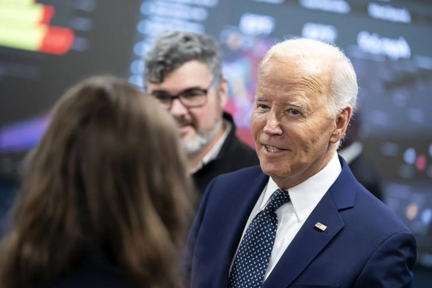 President Joe Biden greets employees at the D.C. Emergency Operations Center after receiving a briefing on extreme weather a briefing from National Weather Service, Department of Homeland Security, FEMA and Department of Labor officials on extreme weather throughout the United States, in Washington, DC, USA, 02 July 2024. (EPA)